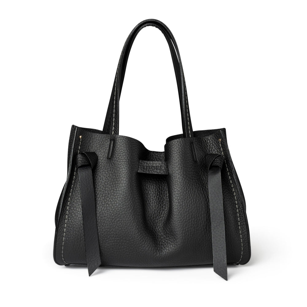 Black handbag with bow details on a white background
