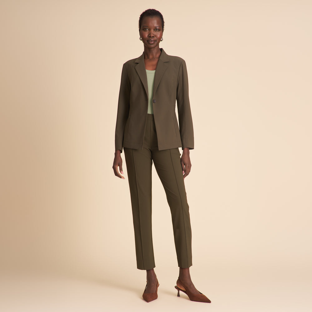 Woman wearing the Colby pant in olive