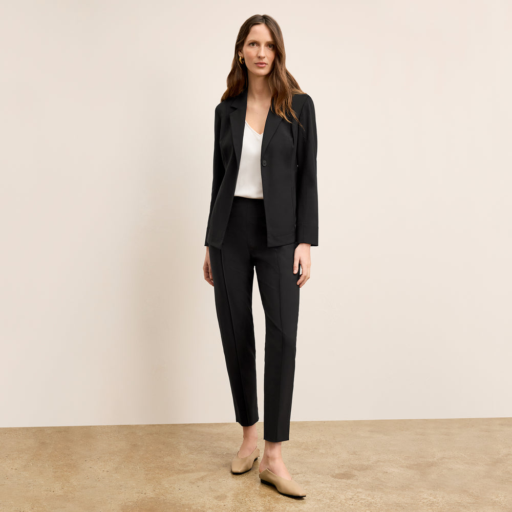 Front image of a woman wearing the Moreland jacket in Black
