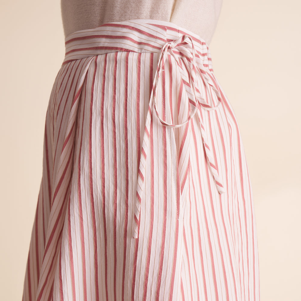 white and orange stripped skirt up close.