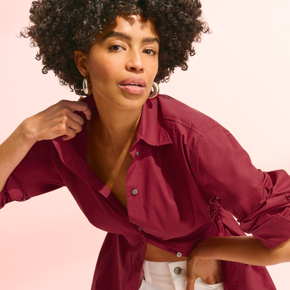 front image of a woman wearing the boden top in cinnabar