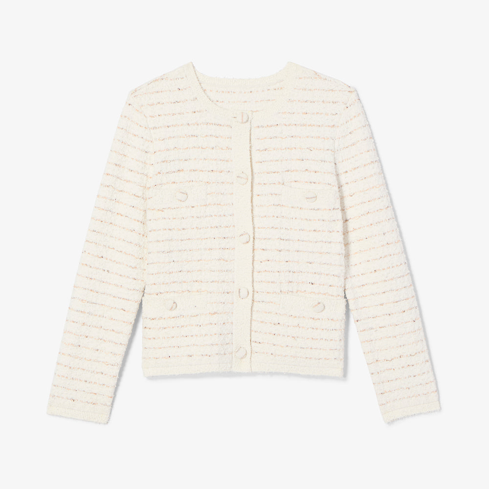 White ribbed knit cardigan on a light gray background