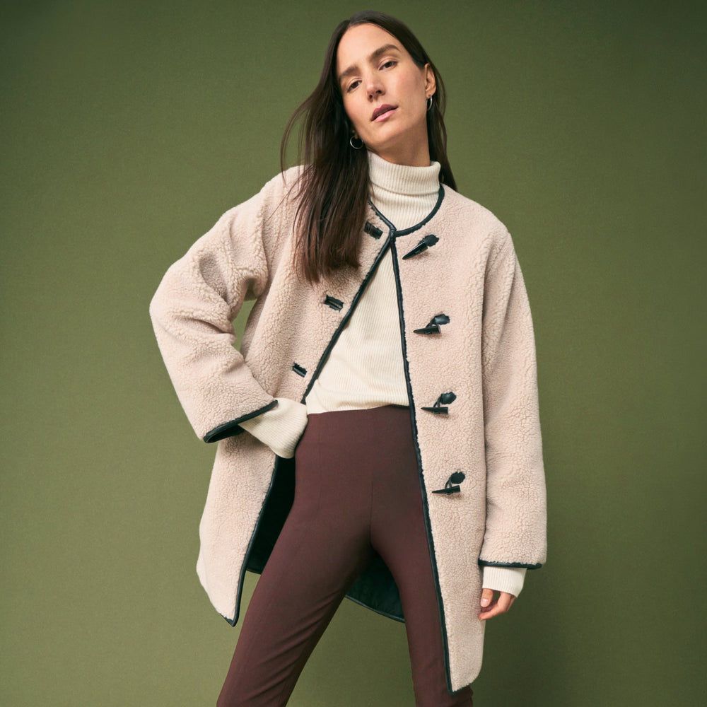 front image of a woman wearing the foster pants in Mahogany