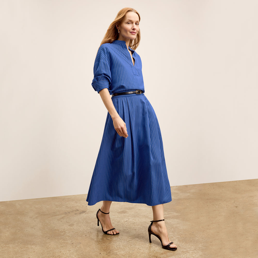 front image of a woman wearing the kylan top in soft stripe