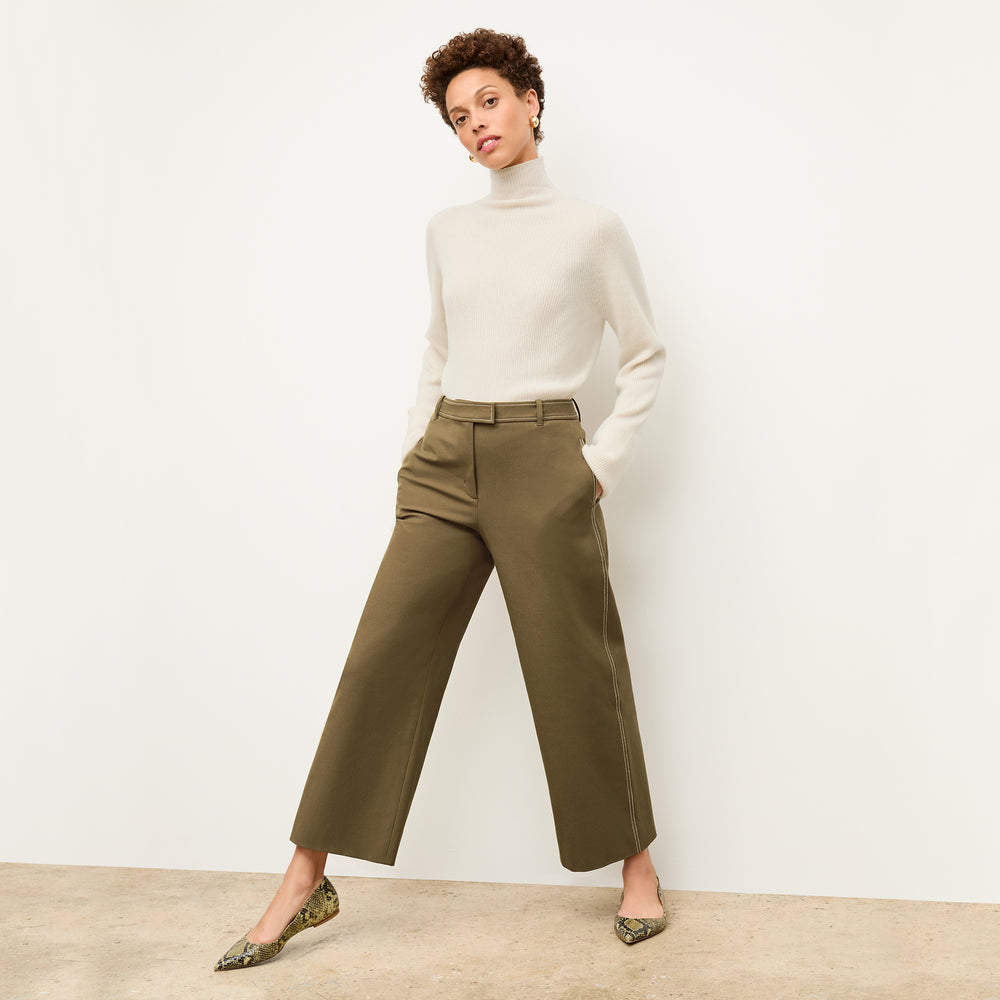 front image of a woman wearing the abby pant in oregano