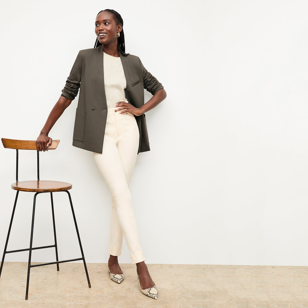 Front image of a woman wearing the Sammataro Jean in Tusk