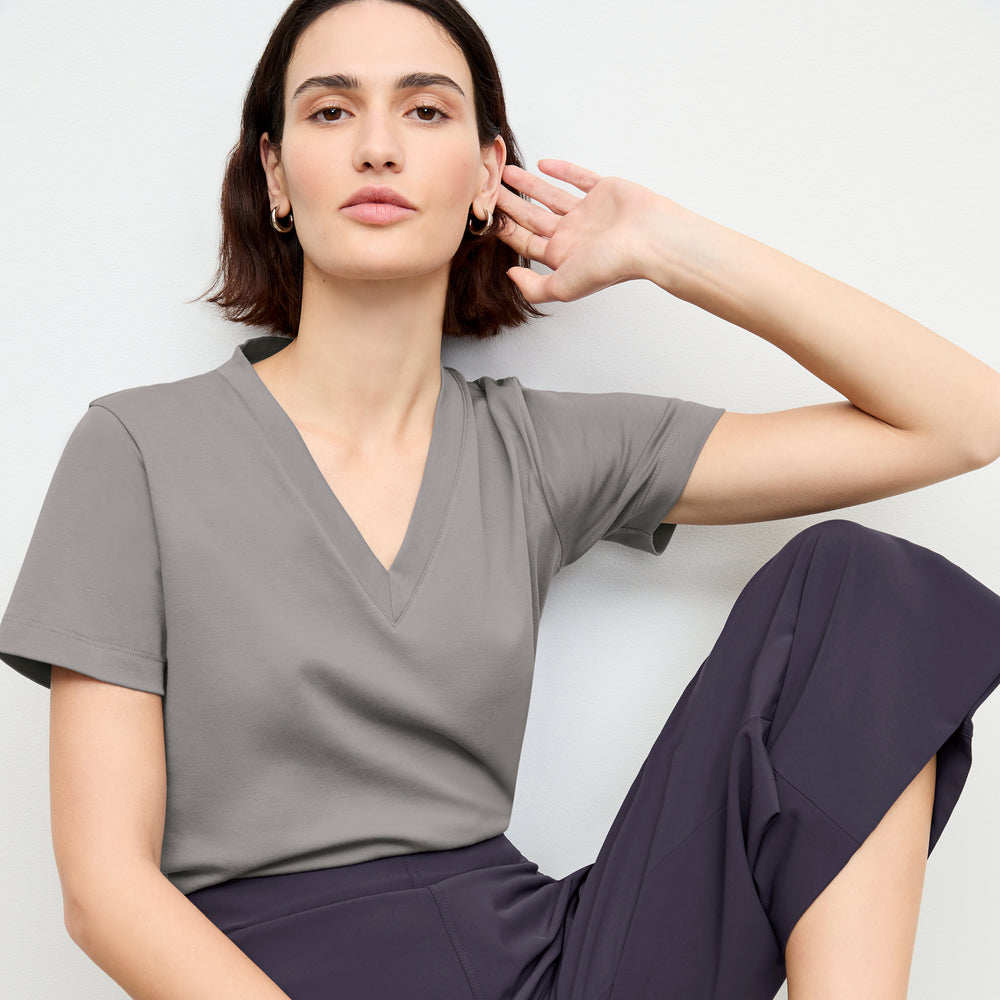 front image of a woman wearing the lee t-shirt in thistle