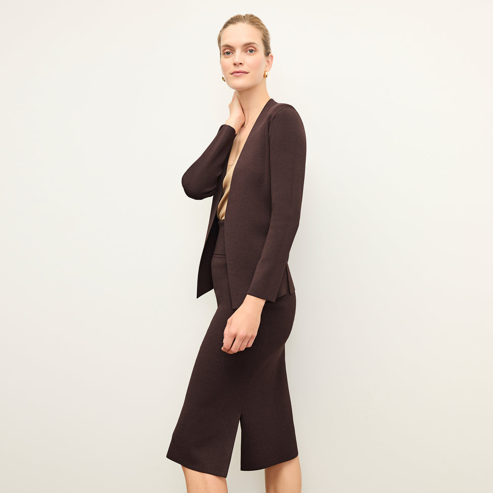 side image of a woman wearing the Harlem Skirt in Chocolate