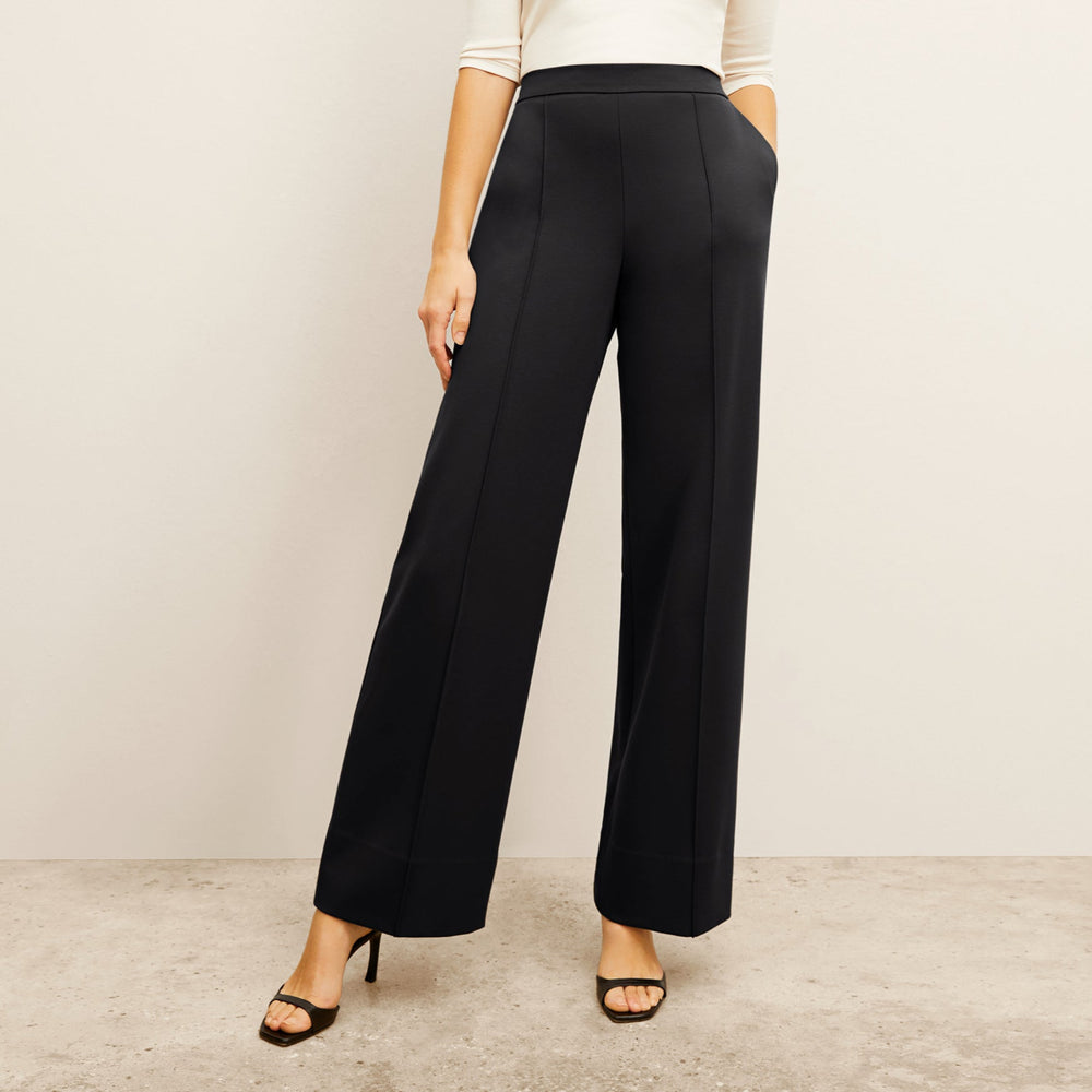 front image of a woman wearing the jordan trouser in black