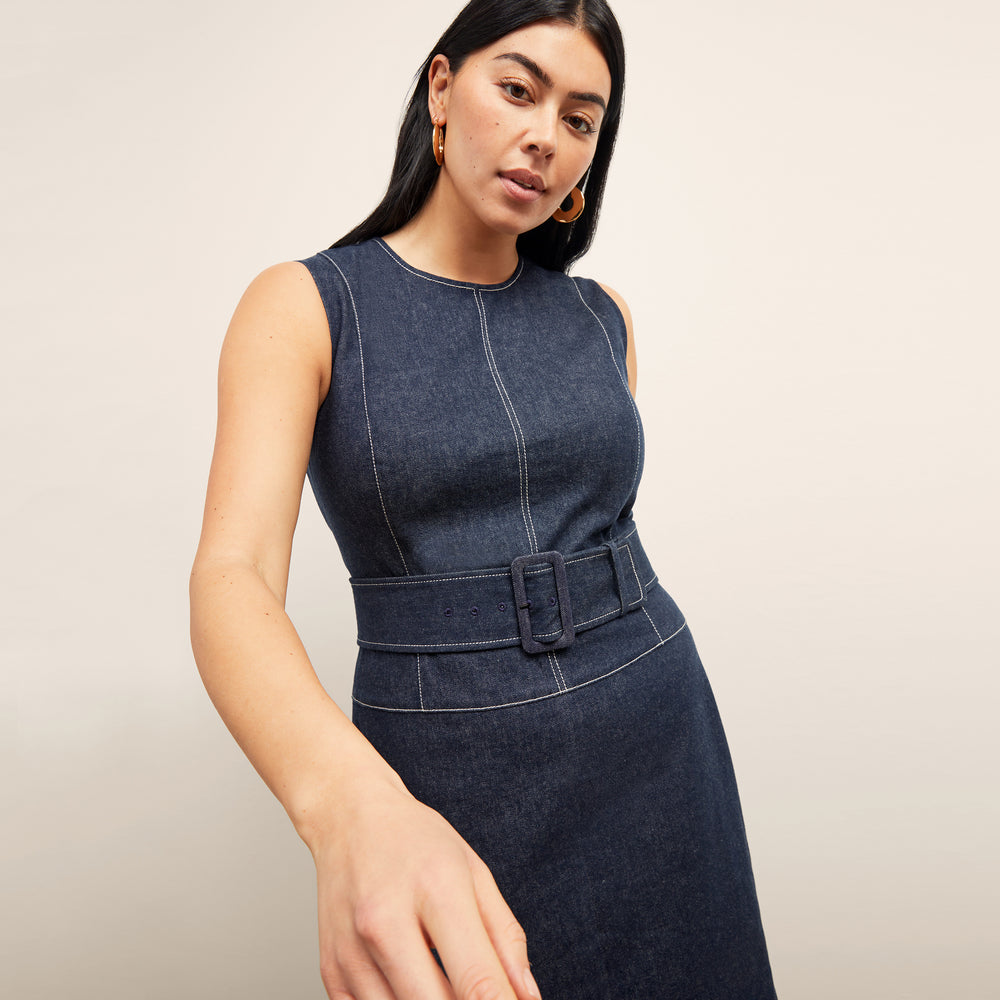 front image of a woman wearing the maude dress in dark wash