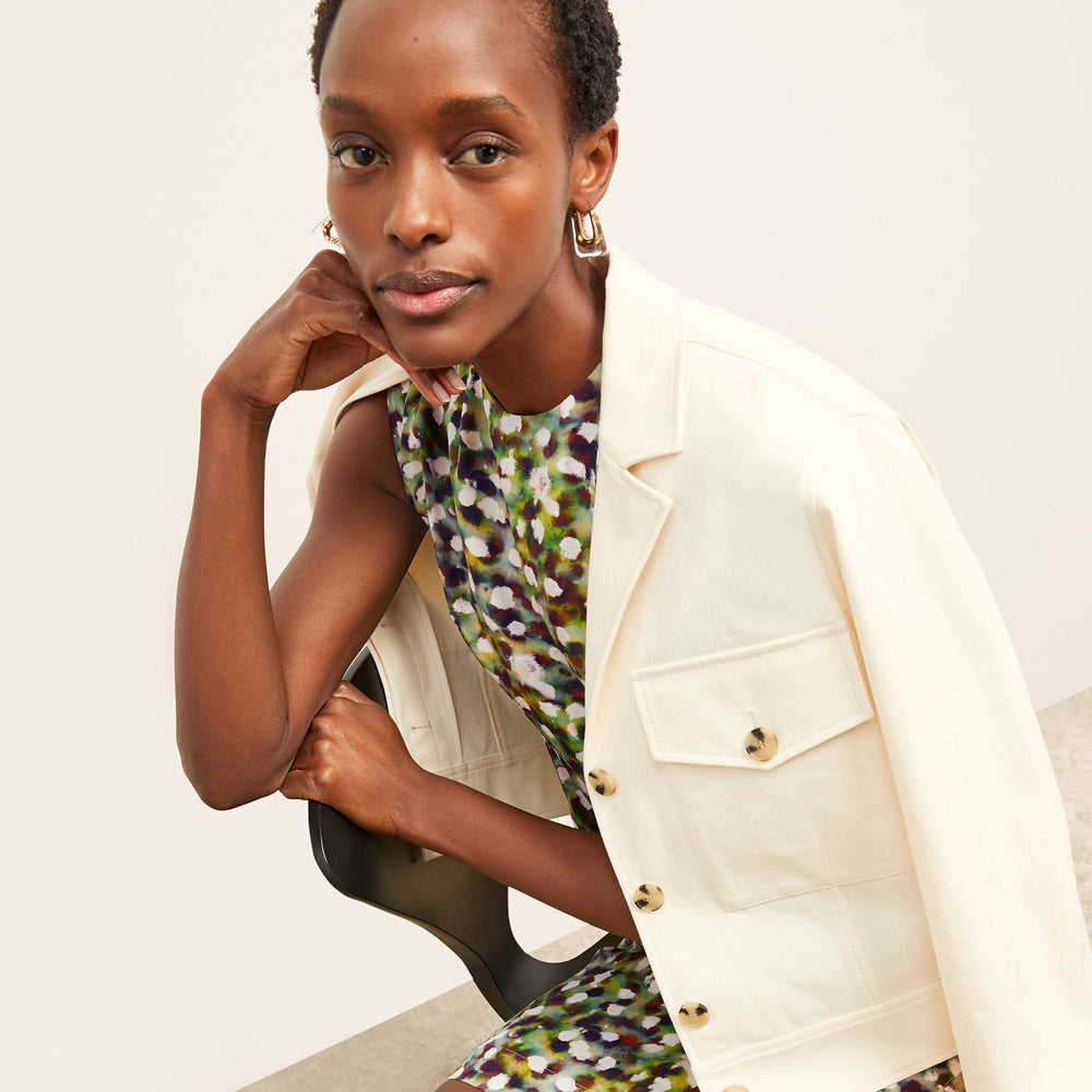 front image of a woman wearing the maaza dress in spotlight print