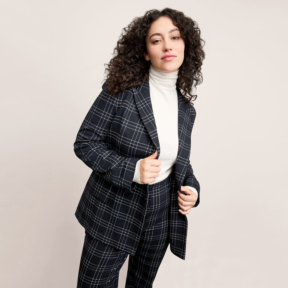 front image of a woman wearing the horton pant in black/white