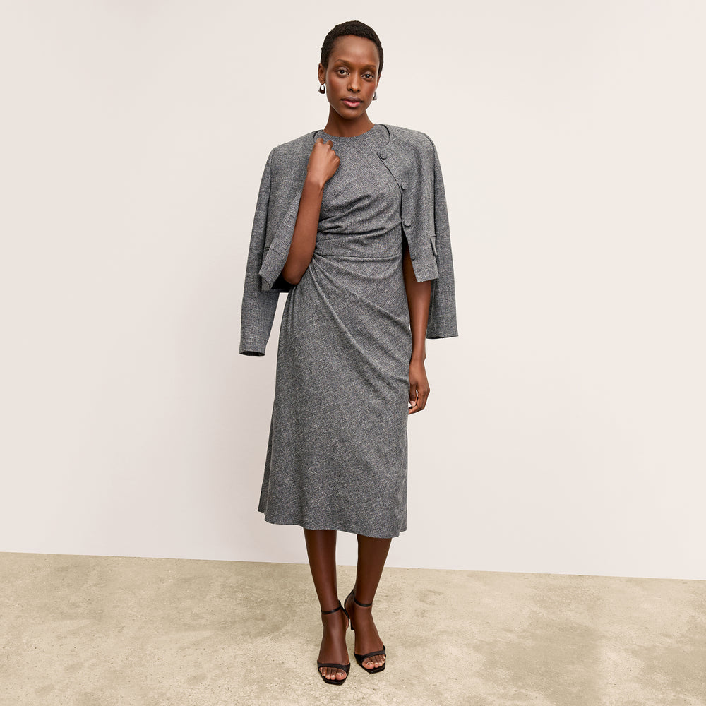 front image of a woman wearing the aniya jacket in black/white