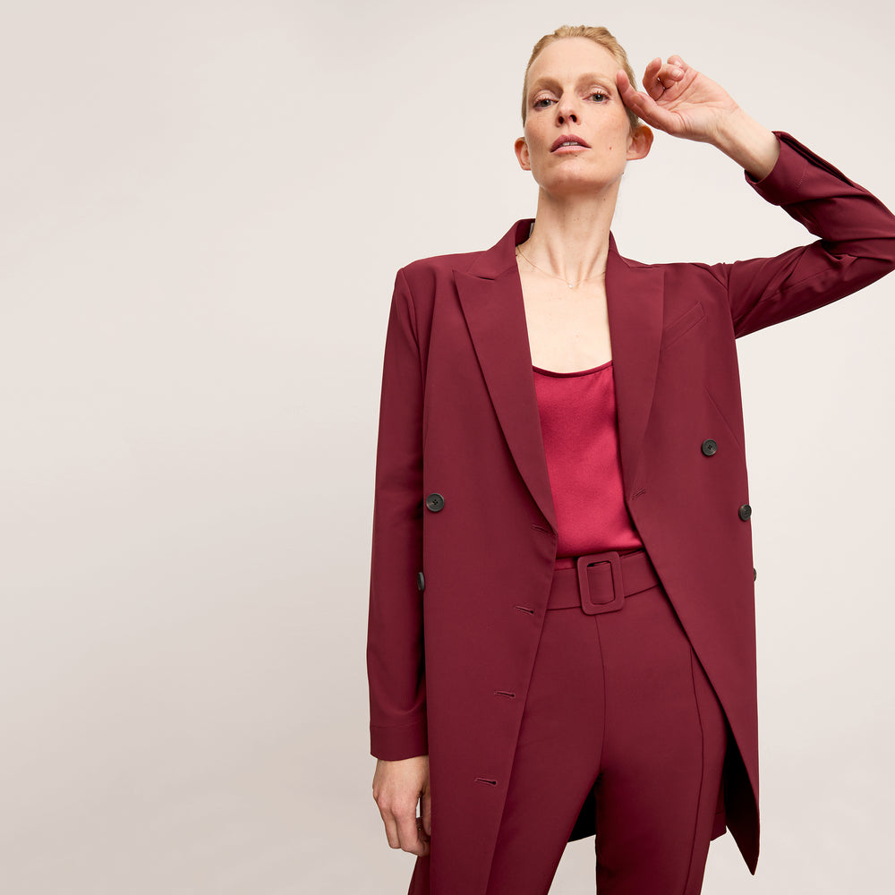 Front image of a woman wearing the Gwynne Dress in Berry Jam