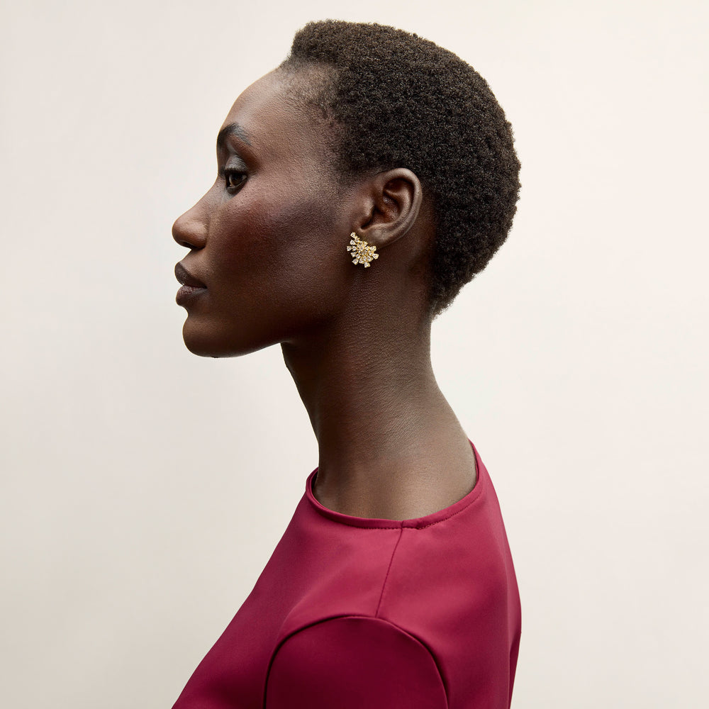 image of a woman wearing the nives earring