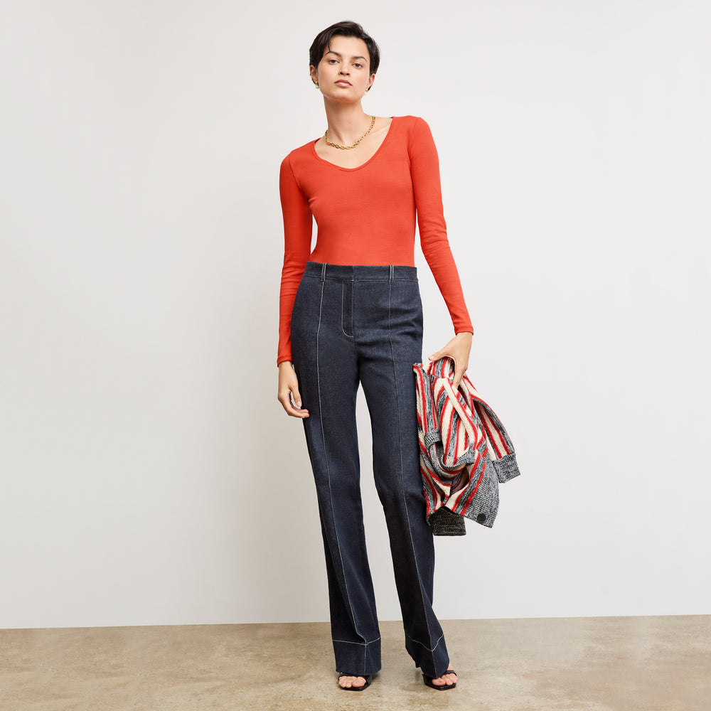 front image of a woman wearing the marcia shirt in marmalade