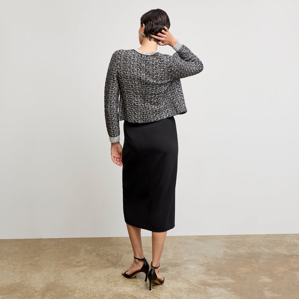 back image of a woman wearing the meena jardigan in boucle tweed black/white