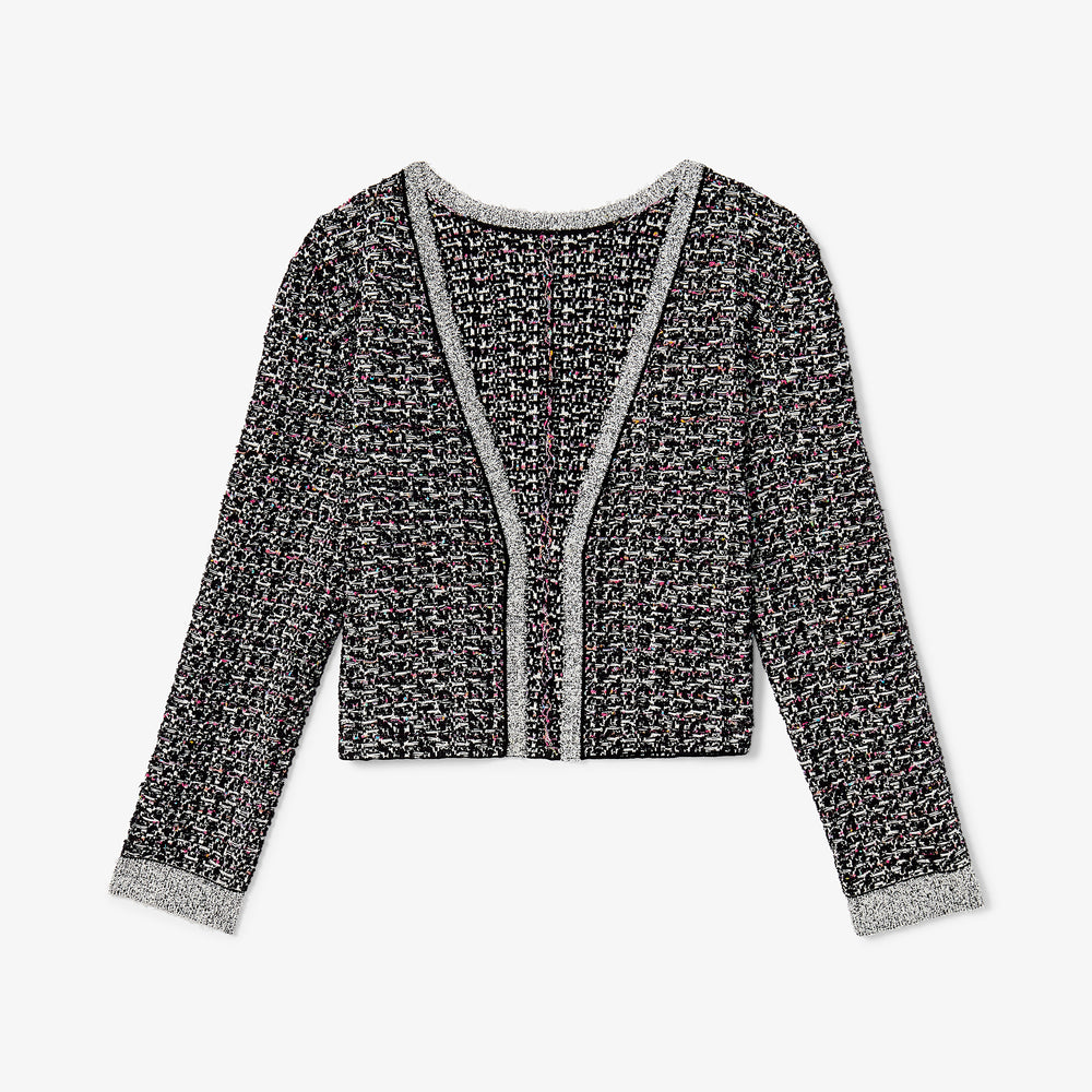 packshot image of the meena jardigan in boucle tweed black/white