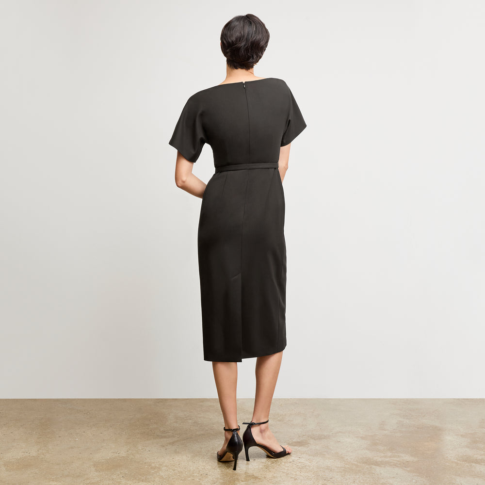 back image of a woman wearing the meredith dress in black