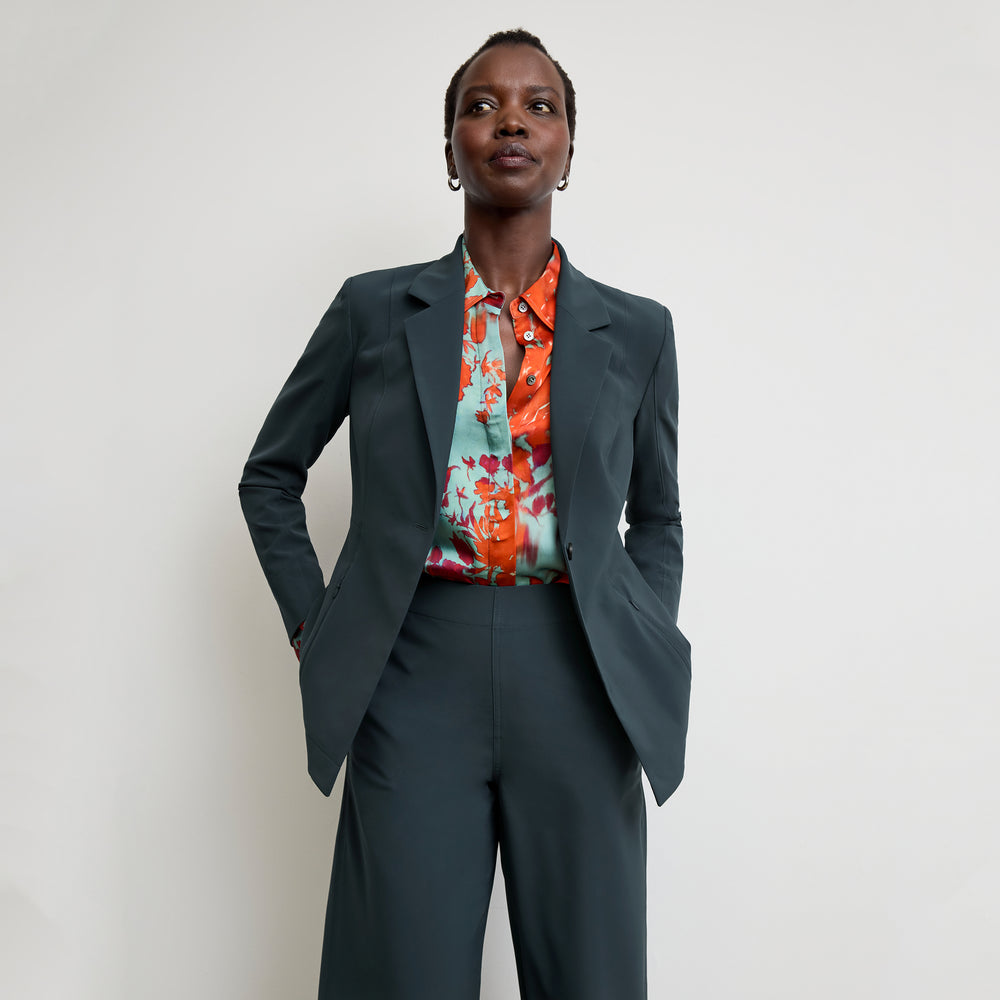 Front image of a woman wearing the Mira Top in Ombre Floral Printed Viscose