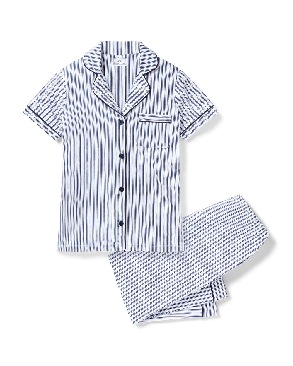 Navy and white striped pajama set on a white background