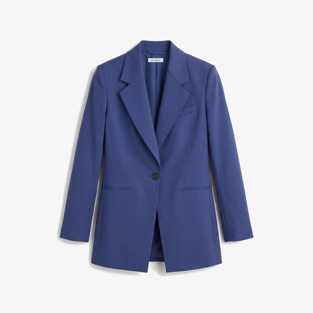 Blue blazer on a light gray background