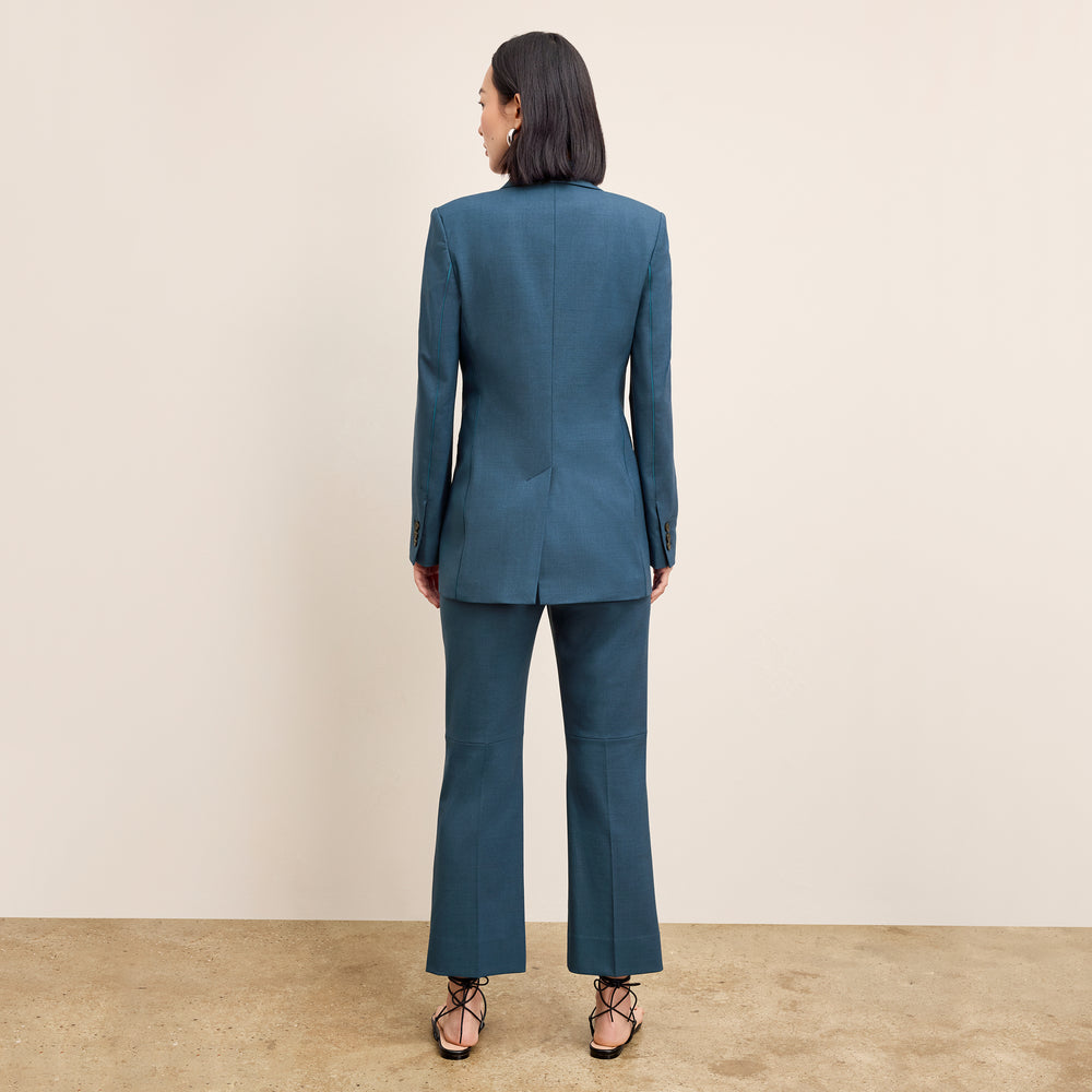 back image of a woman wearing the tessa pant in bluebell
