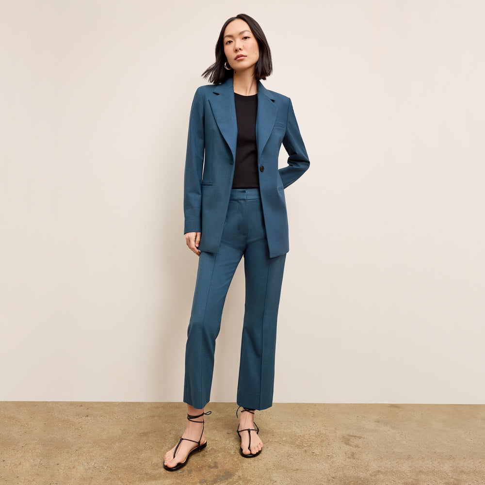 front image of a woman wearing the tessa pant in bluebell