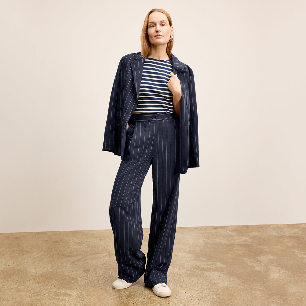 Front image of a woman wearing the Fitz Trouser in Porto Weave