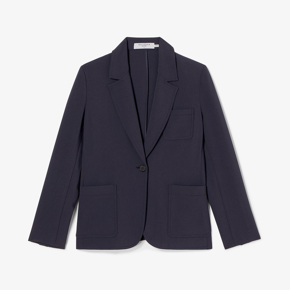Navy blazer on a light gray background