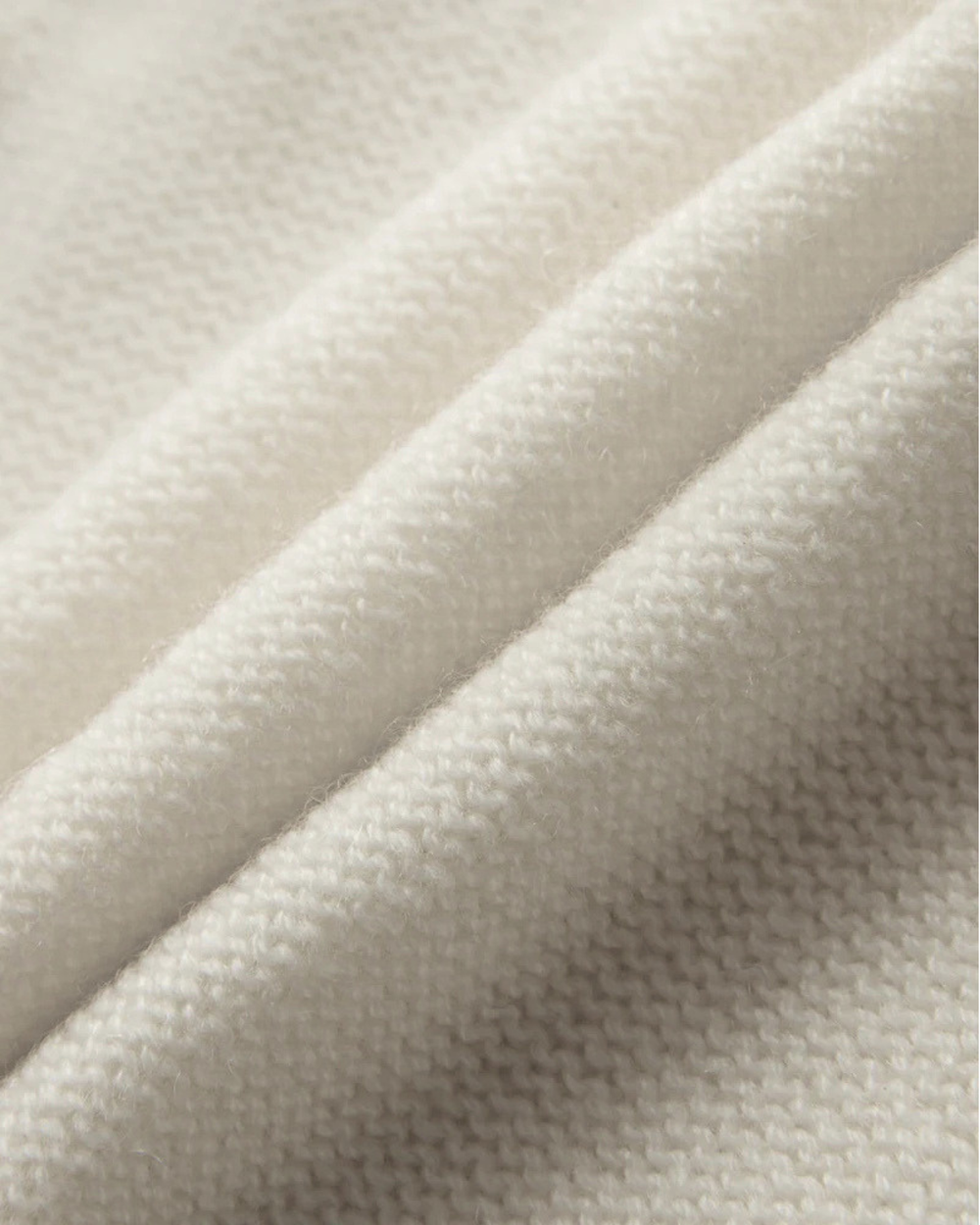 Close-up of textured white fabric.