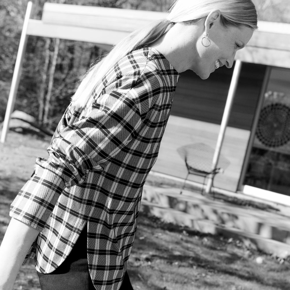 front image of a woman wearing the tully top in checkmate