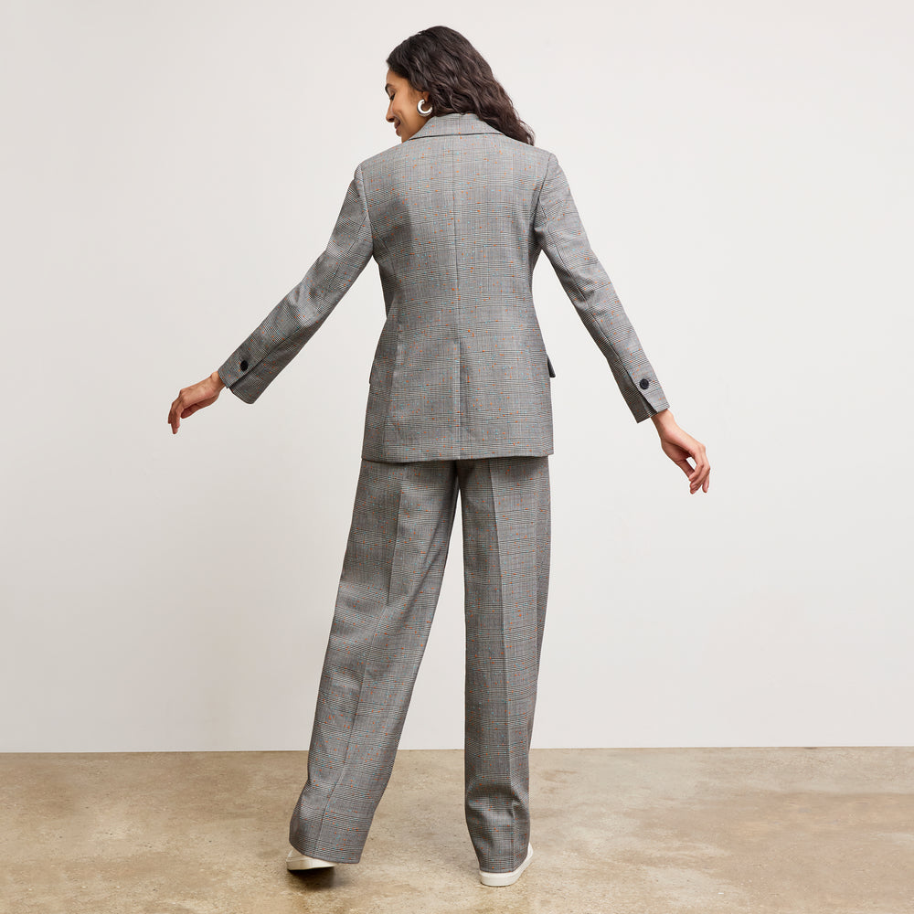 back image of a woman wearing the Tyner Blazer in Sharkskin in Mixed Check