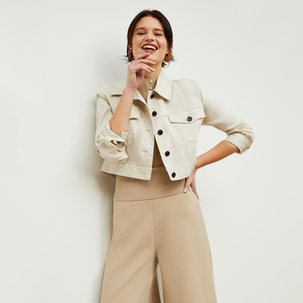 Front image of a woman standing wearing the rogala culotte in latte