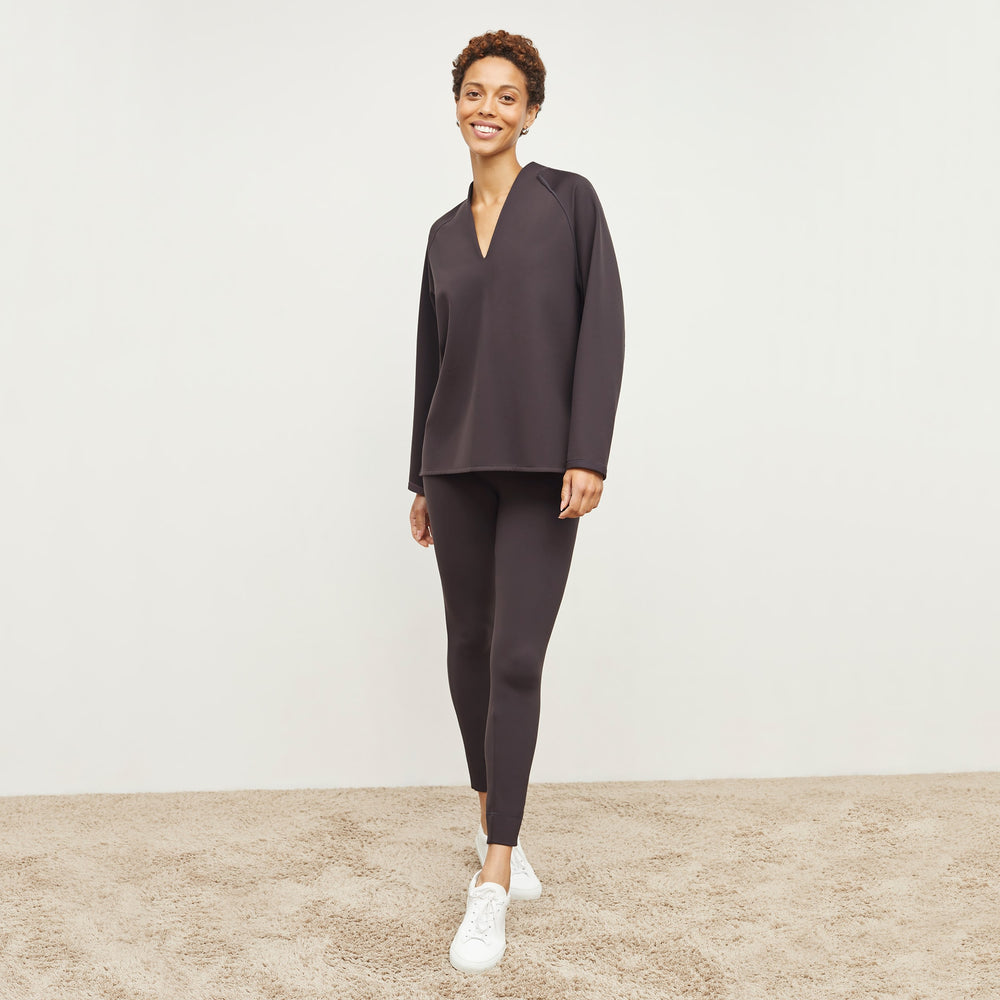 Front image of a woman standing wearing the Harrington Legging—Light Scuba in Haze