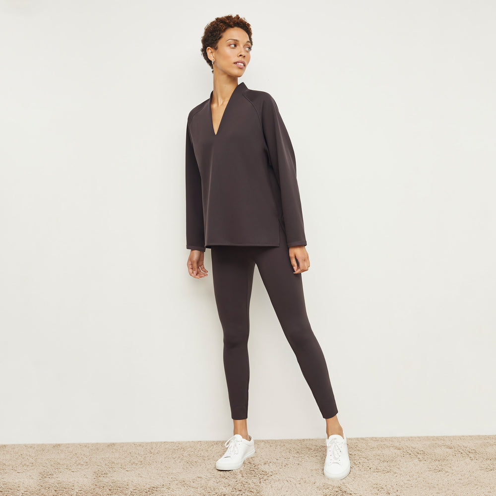 Front image of a woman standing wearing the Harrington Legging—Light Scuba in Haze