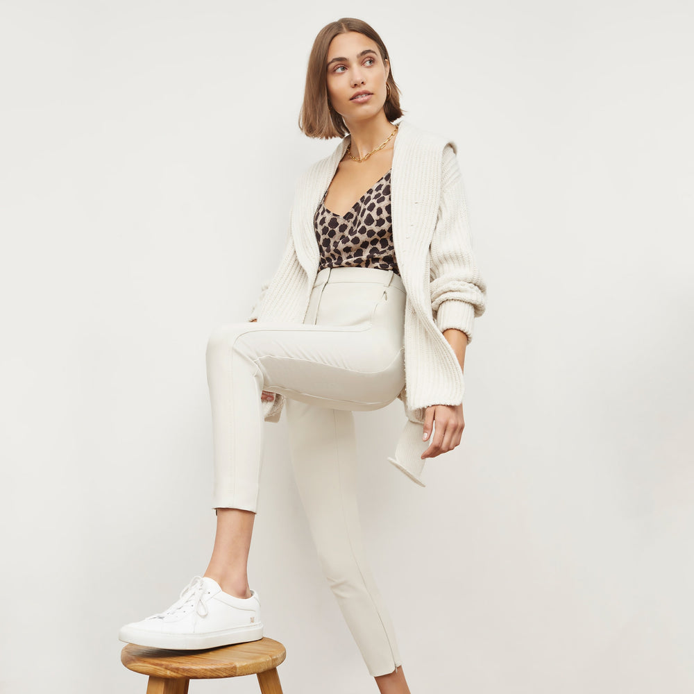 Front image of a woman standing wearing the Snyder Jacket in Ivory