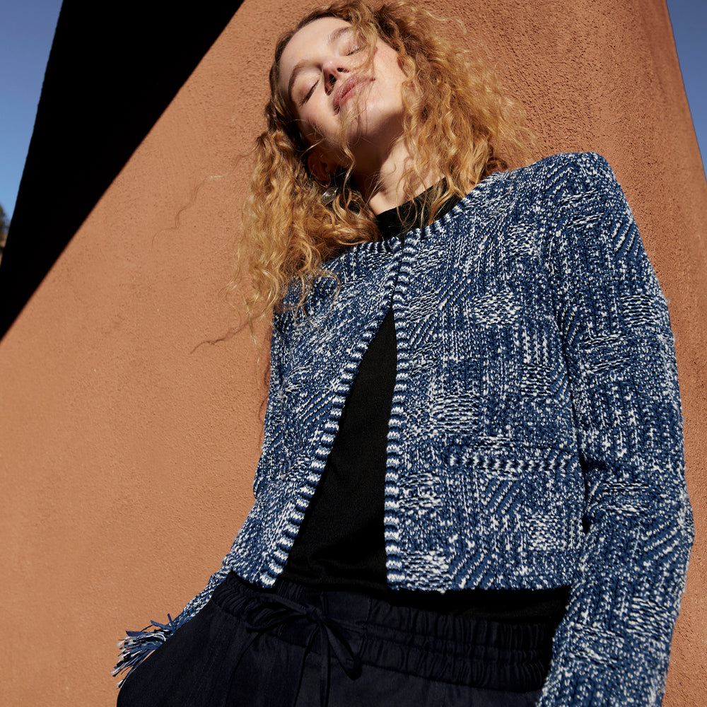 Front image of a woman wearing the Lilia Jacket - Interweave in Navy / Ivory