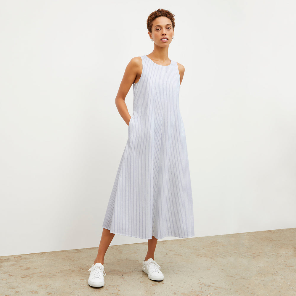 Front image of a woman wearing the Fatima Dress - Poplin Stripe in Blue / Ivory
