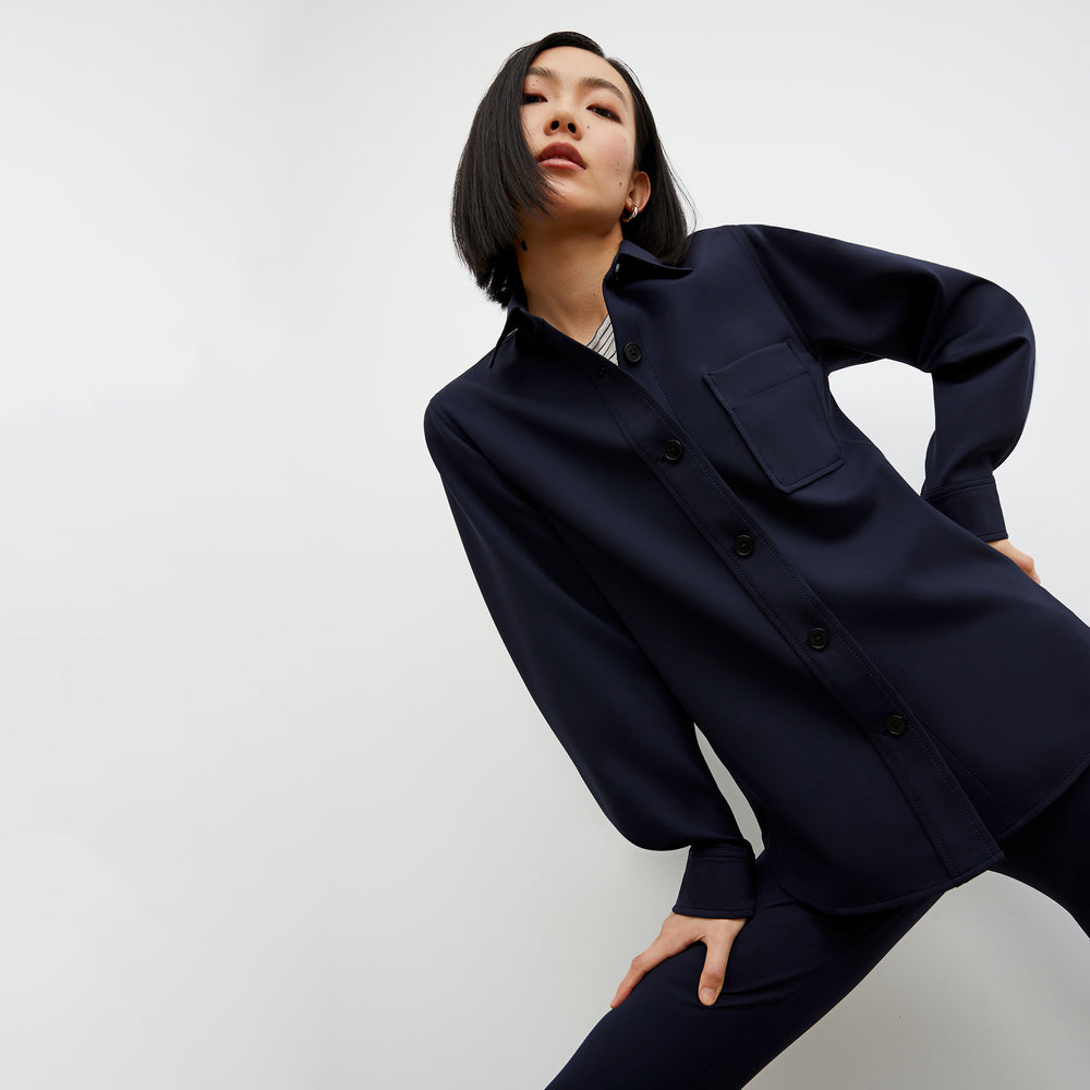 Front image of a woman wearing the Harrington Legging - Light Scuba in Space Blue