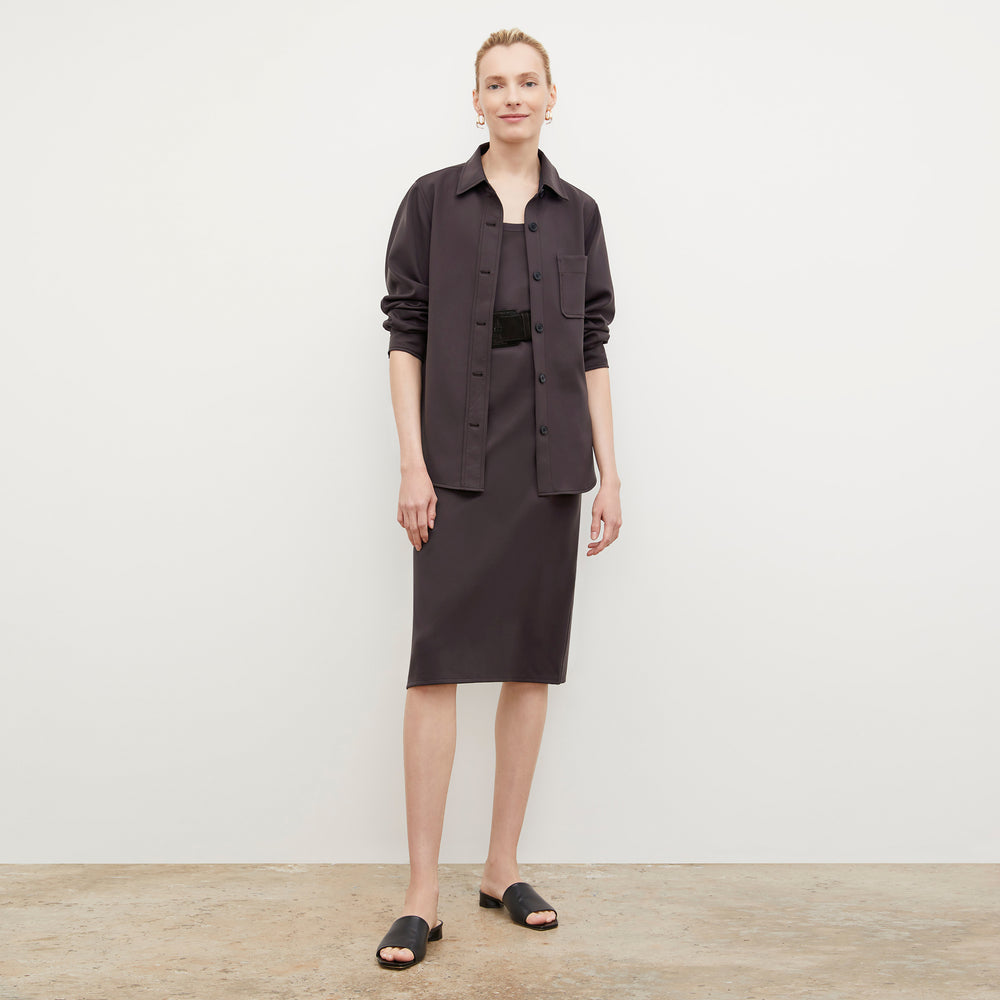 Front image of a woman standing wearing the Elsa Dress—Light Scuba in Haze