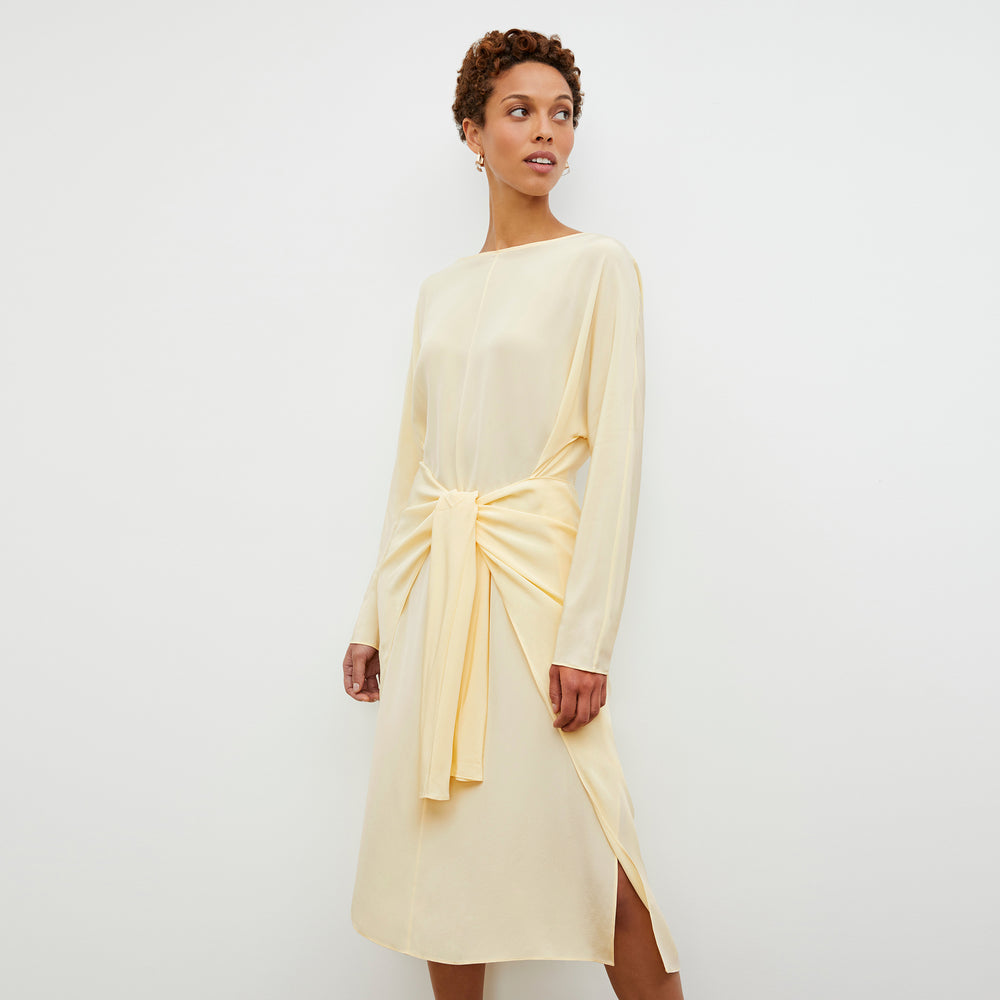 Front image of a woman wearing the Rashmeen Dress - Washable Silk in Parchment