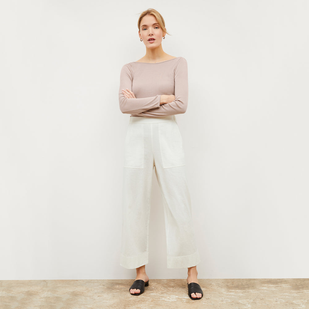 Image of a woman wearing the Madelyn Pant in Ivory