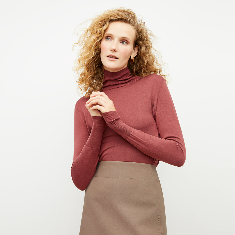 Front image of a woman wearing the Elizabeth Top in Rosewood