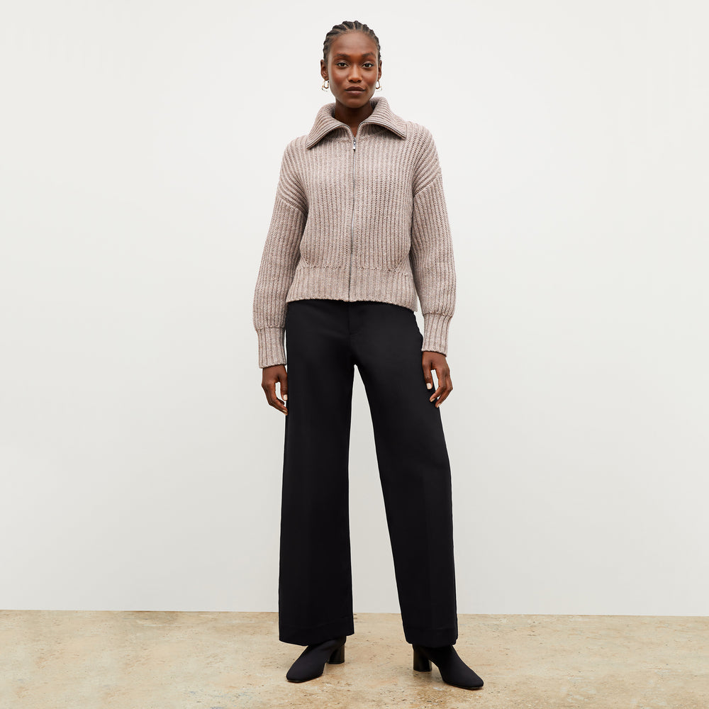 Front image of a woman wearing the william sweater in barley
