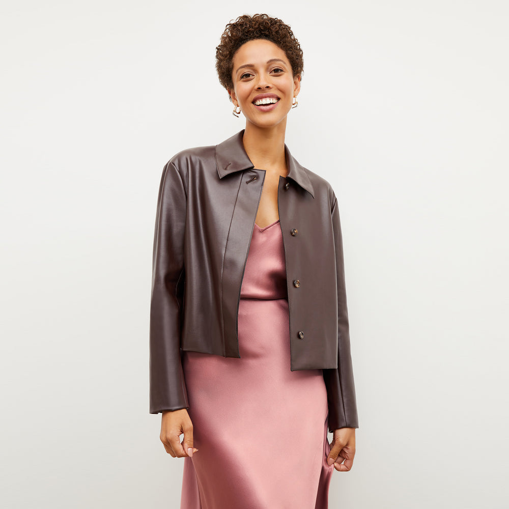 Front image of a woman wearing the nicky jacket in brown