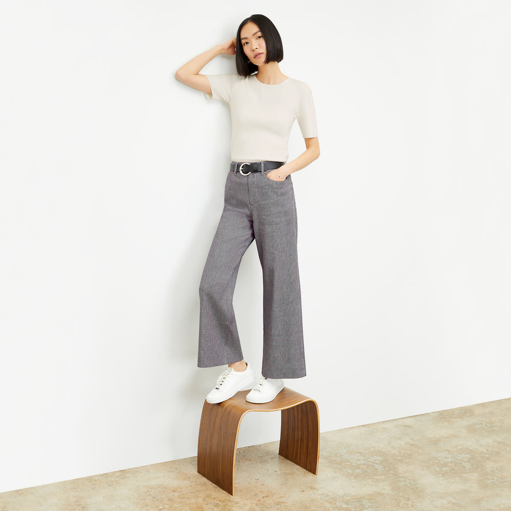 front image of a woman wearing the milo pant in gingham linen
