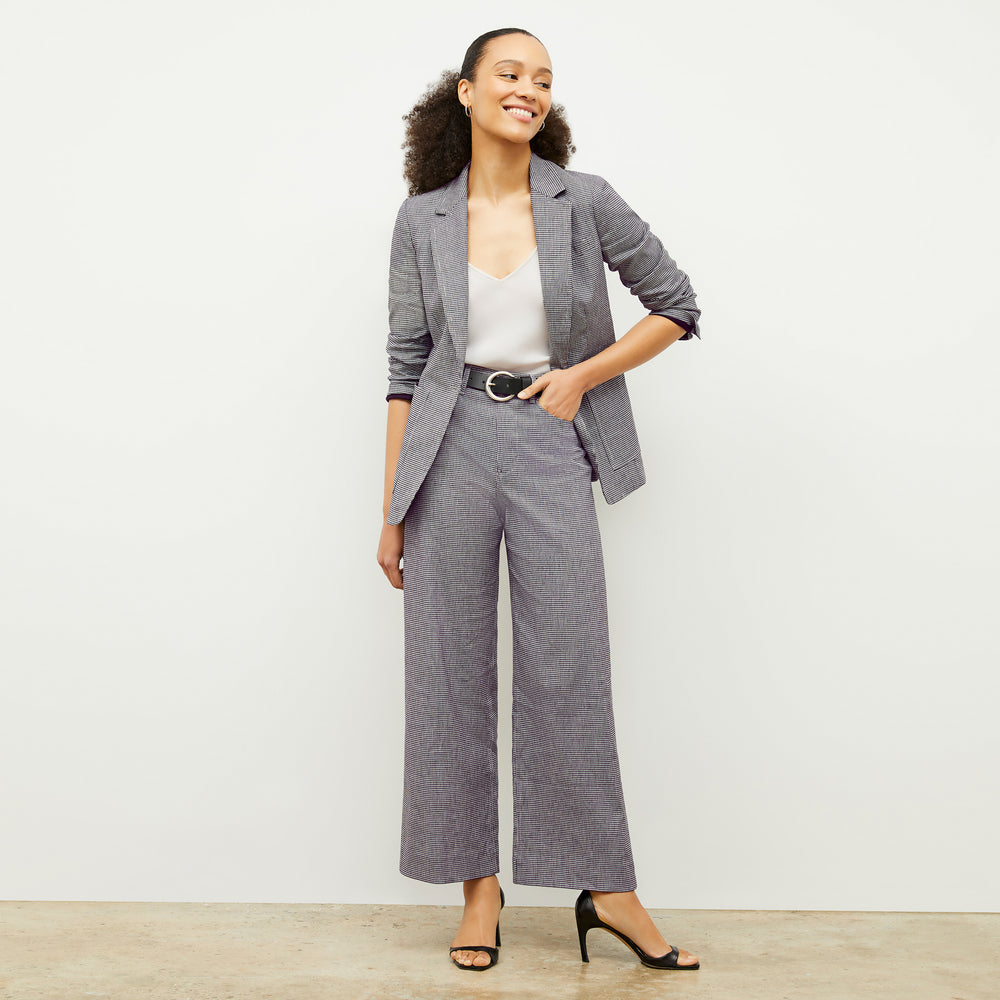 front image of a woman wearing the milo pant in gingham linen