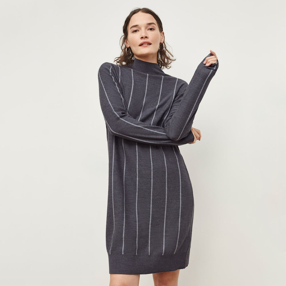 Front image of a woman standing wearing the Effy Dress—Braided Stripe in Charcoal / Ivory