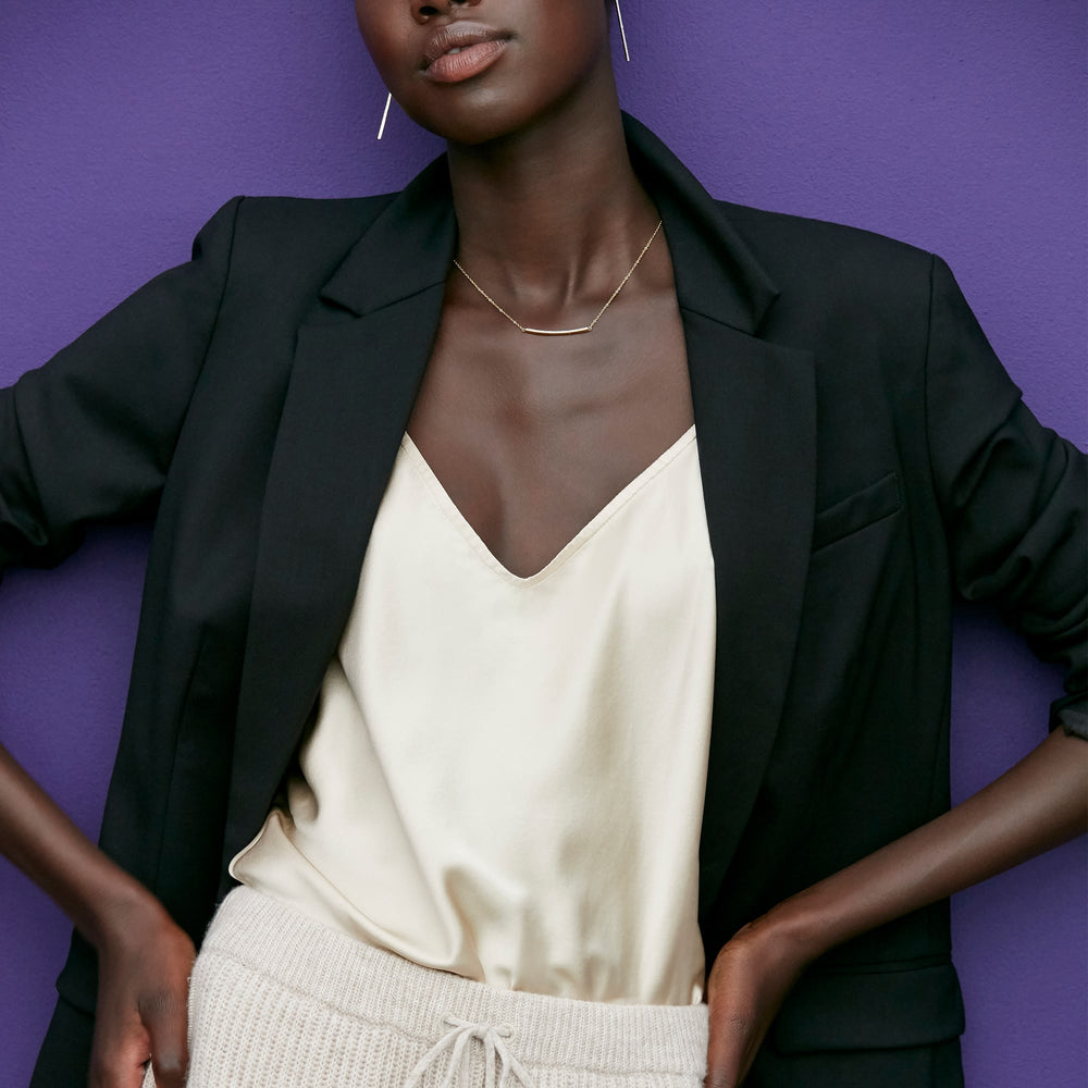 Front image of a woman standing wearing the Addison Jogger—Cashmere/Wool in Oatmeal Melange